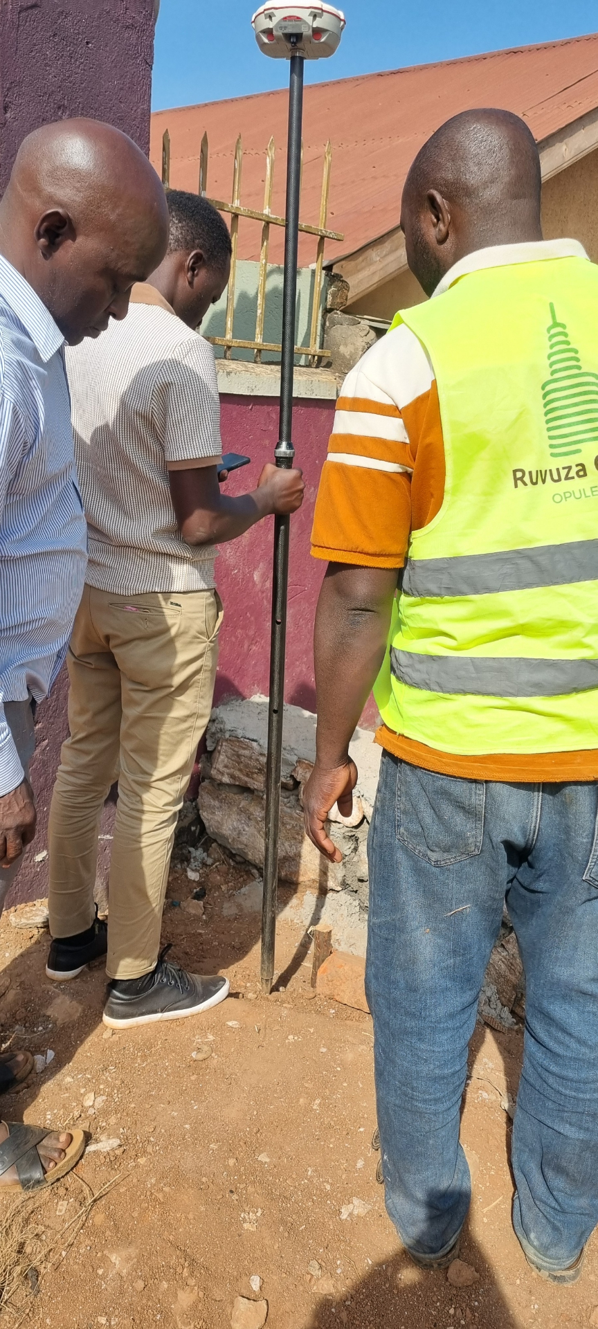 Ruvuza team reviewing finishing details on site